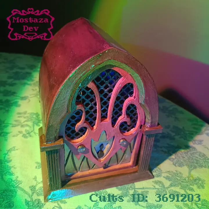 Fotografia de la radio de alastor, impresa en 3d y pintada en tonos rojizos